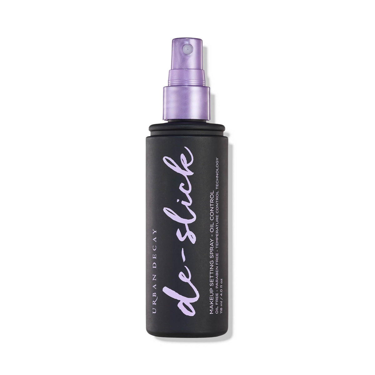 Urban Decay De-Slick bottle front shows oil-control matte setting spray.