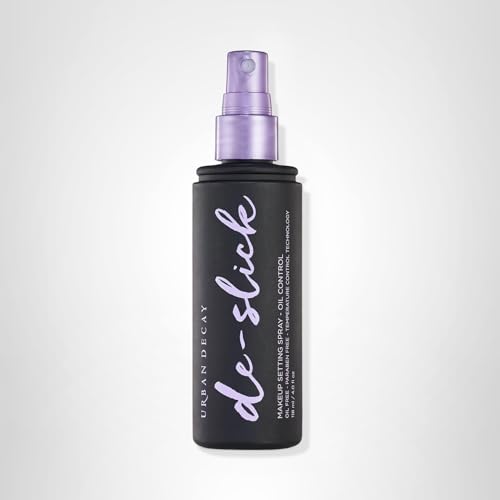 Urban Decay De-Slick microfine spray on skin shows lightweight application.