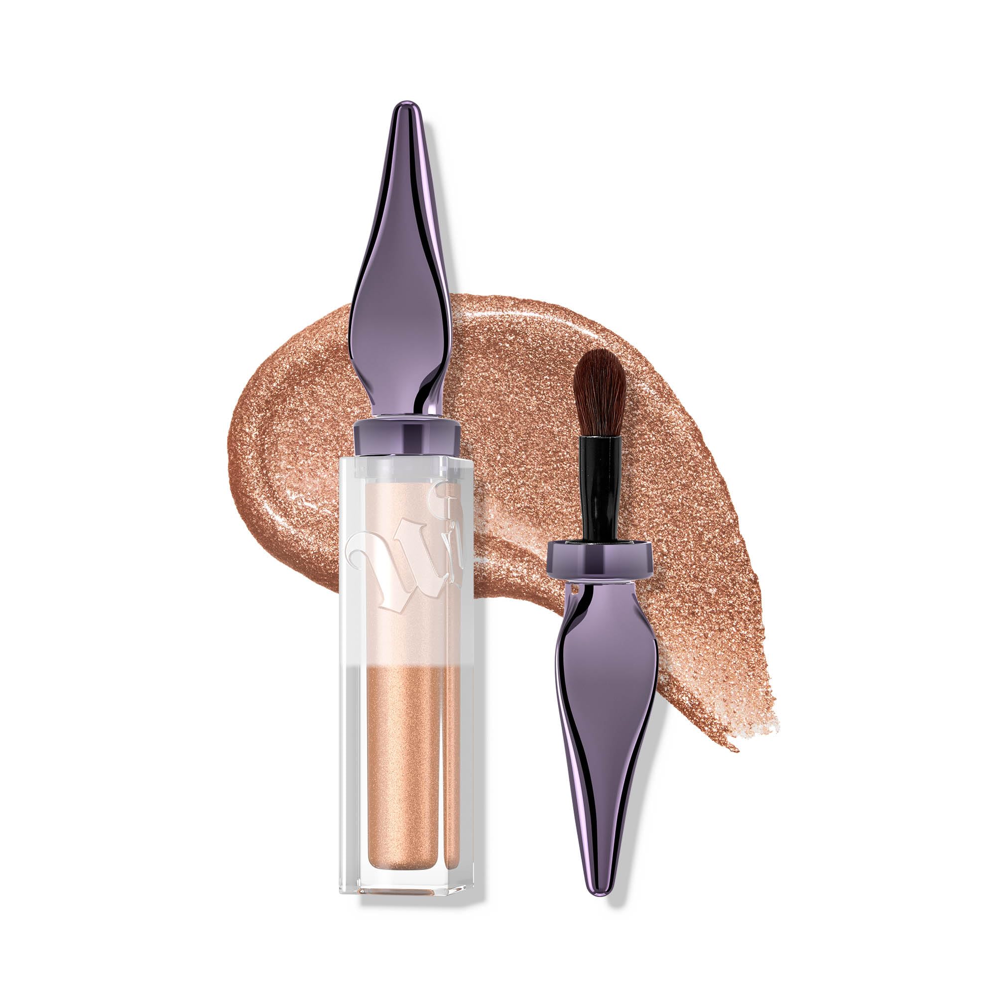 Urban Decay Glaze-On Space Cowboy swatches show light champagne gold shimmer for all-day glow.