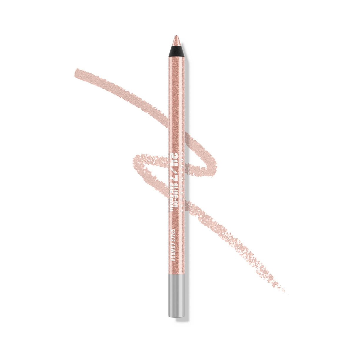 Urban Decay Space Cowboy pencil close-up showing peach shimmer and silver sparkle for soft daytime looks