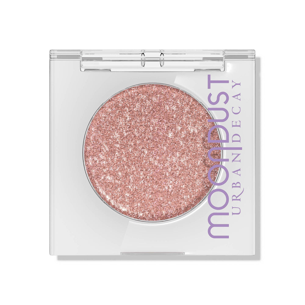 Urban Decay Moondust Crushin' Hard peach-pink with silver pearls delivers long-lasting sparkle on lids.