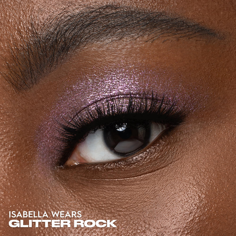Urban Decay Moondust Space Cowboy swatch reveals champagne-gold sparkle for versatile glam.