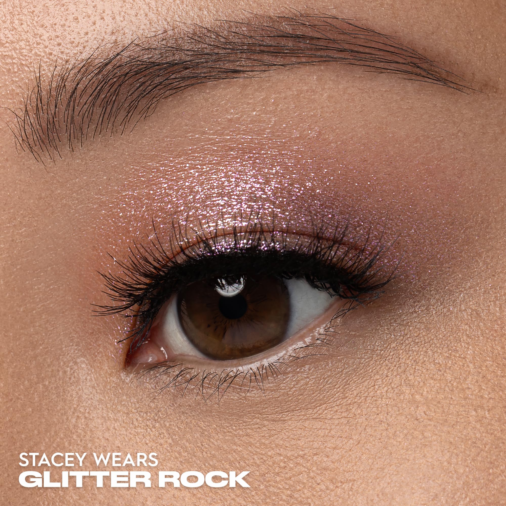 Urban Decay Moondust wet-look finish close-up highlights reflective glow.