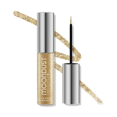 Urban Decay Moondust Liquid Eyeliner Midnight Cowboy bottle pour showing gold glitter shine