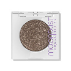 Urban Decay Moondust Space Cowboy swatch shows champagne gold sparkle for bridal glow