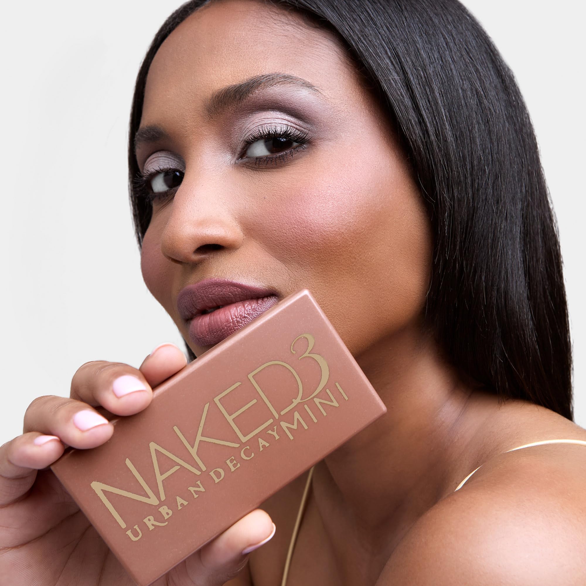 Urban Decay Naked3 Mini matte and shimmer balance for versatile finishes.