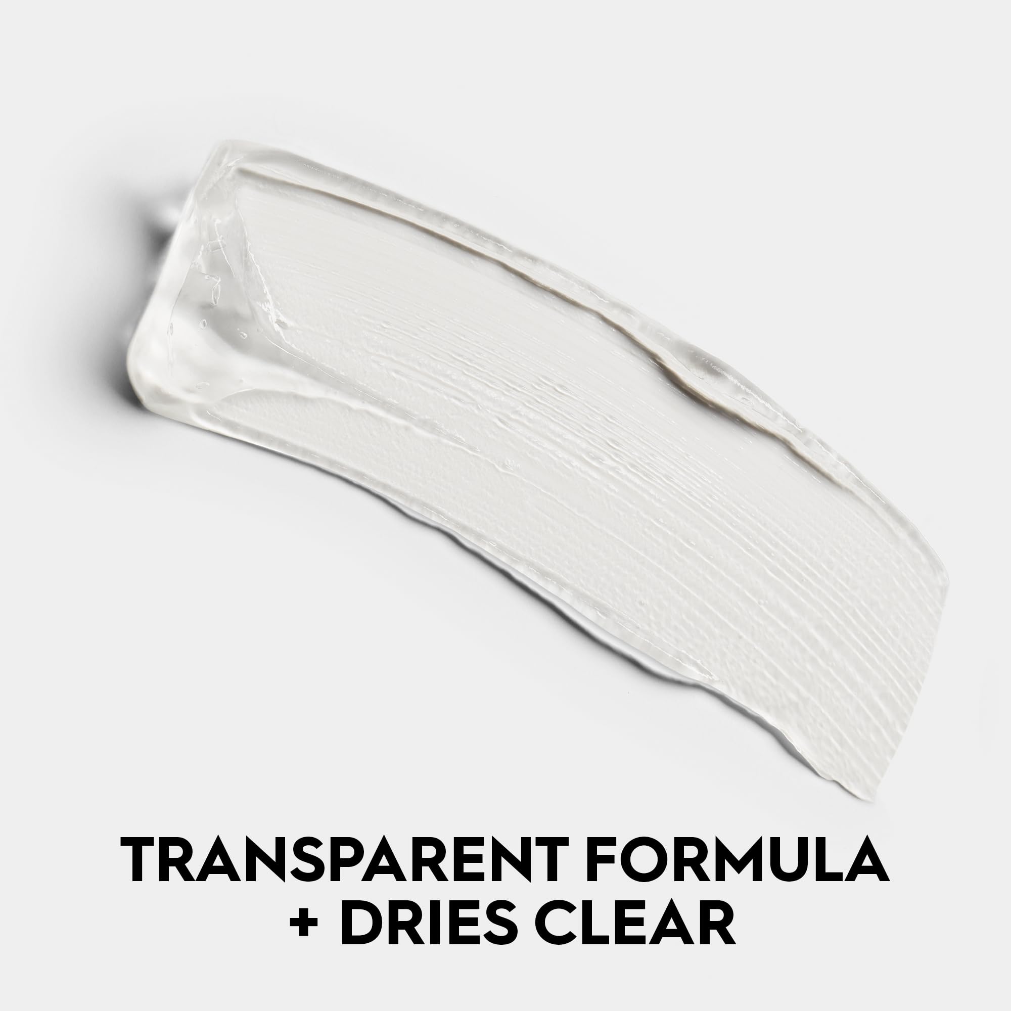 Urban Decay Slick Day Brow Gel vegan formula bottle on clean surface.