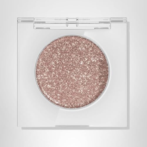 Urban Decay Space Cowboy shade delivers champagne-gold sparkle.