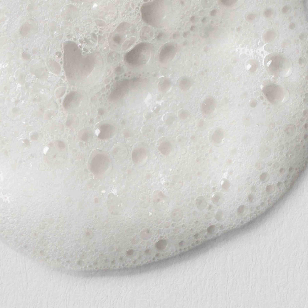 Urban Skin Rx Clear Skin bar texture shows exfoliation particles.