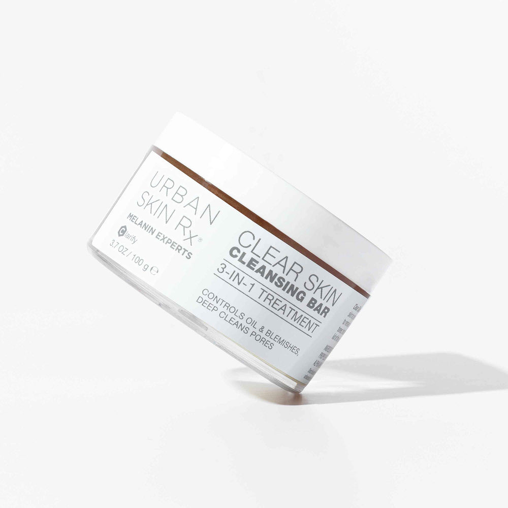 Urban Skin Rx Clear Skin bar on skin demonstrating face application.