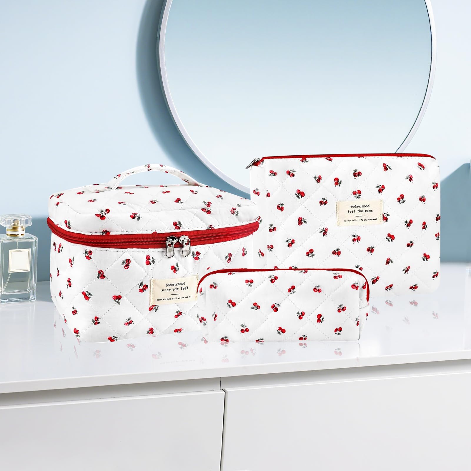 URSKYTOUS coquette quilted makeup bag detail stitched shows soft cotton texture and secure zipper.