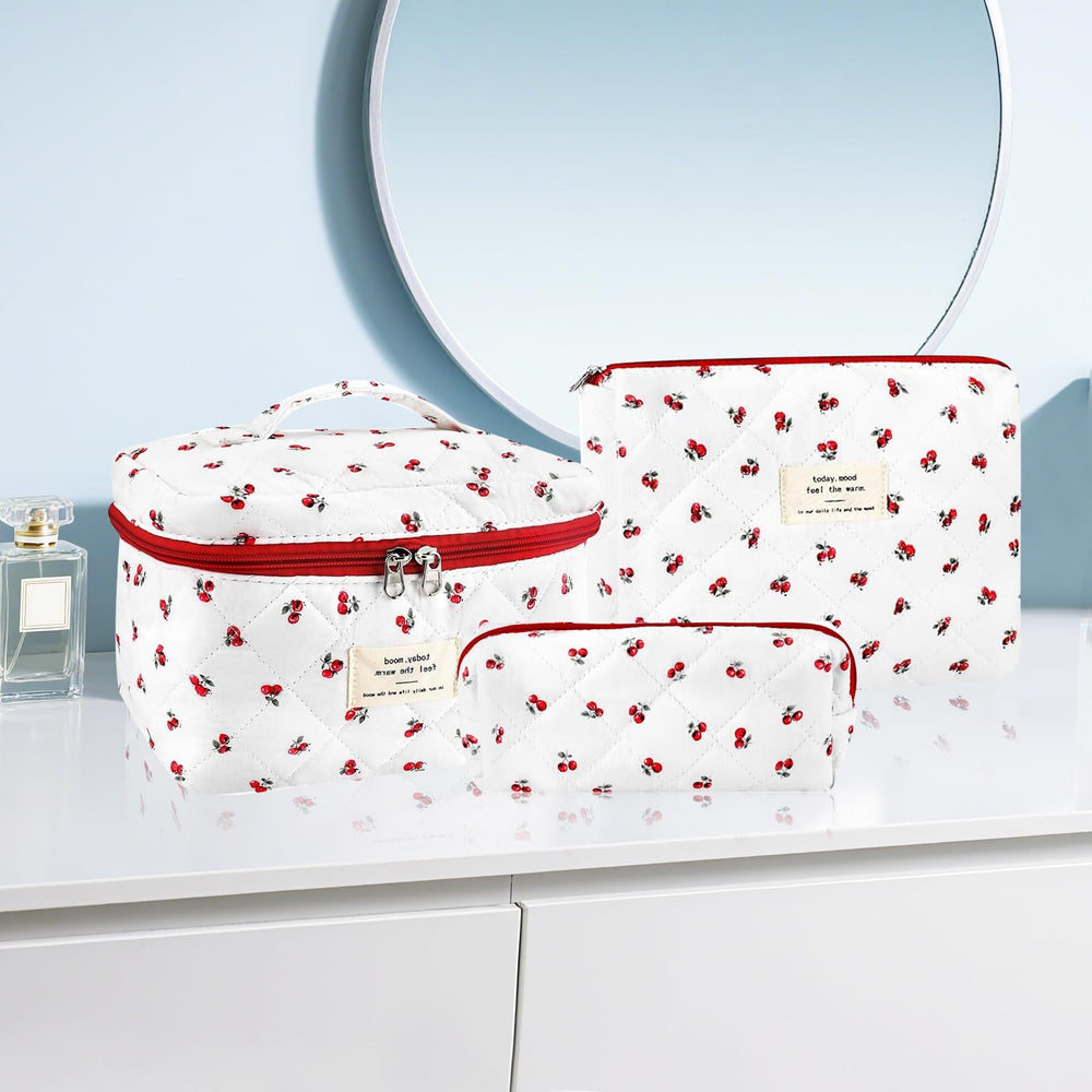 URSKYTOUS coquette quilted makeup bag detail stitched shows soft cotton texture and secure zipper.