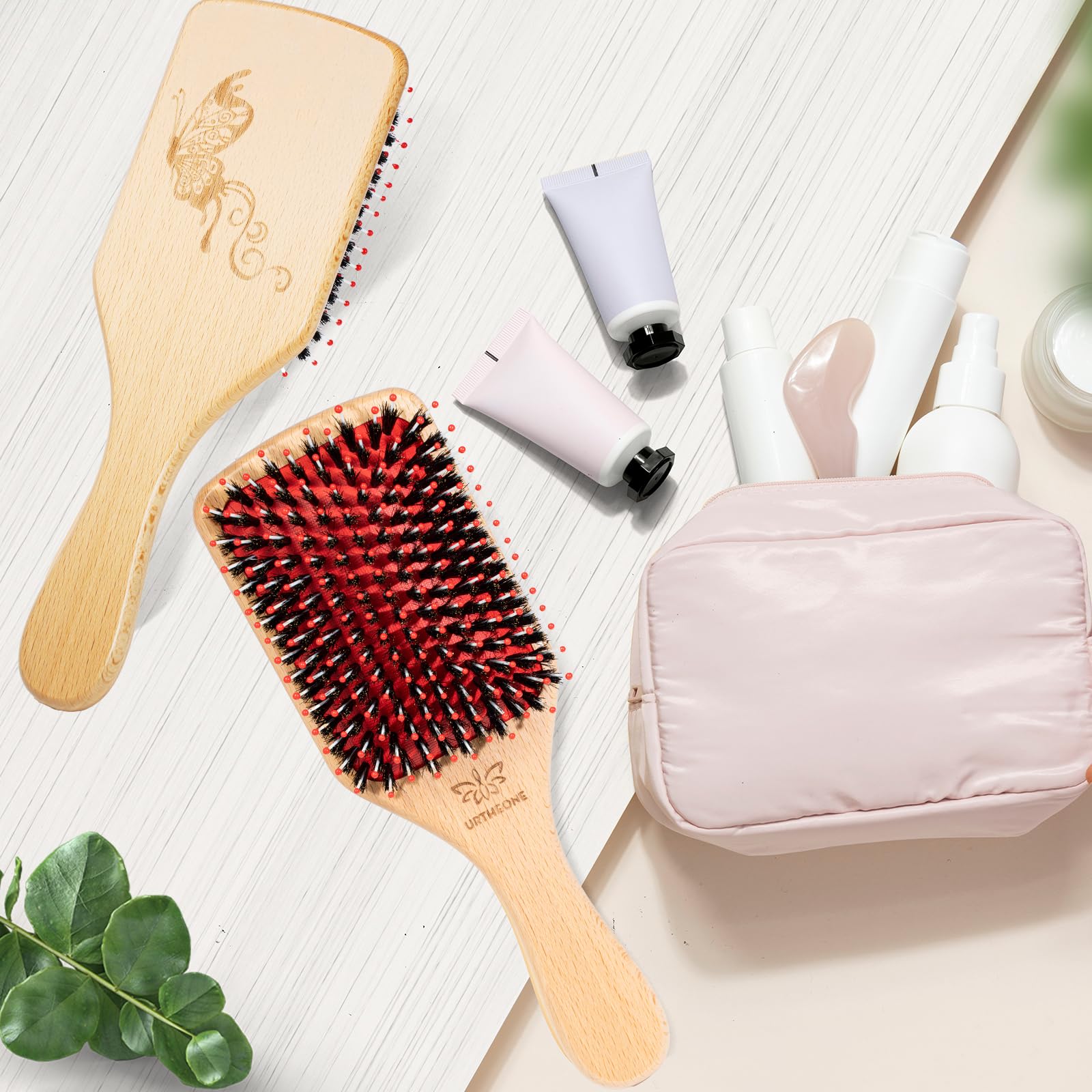 URTHEONE brush in use demonstrates easy detangling and scalp pampering.