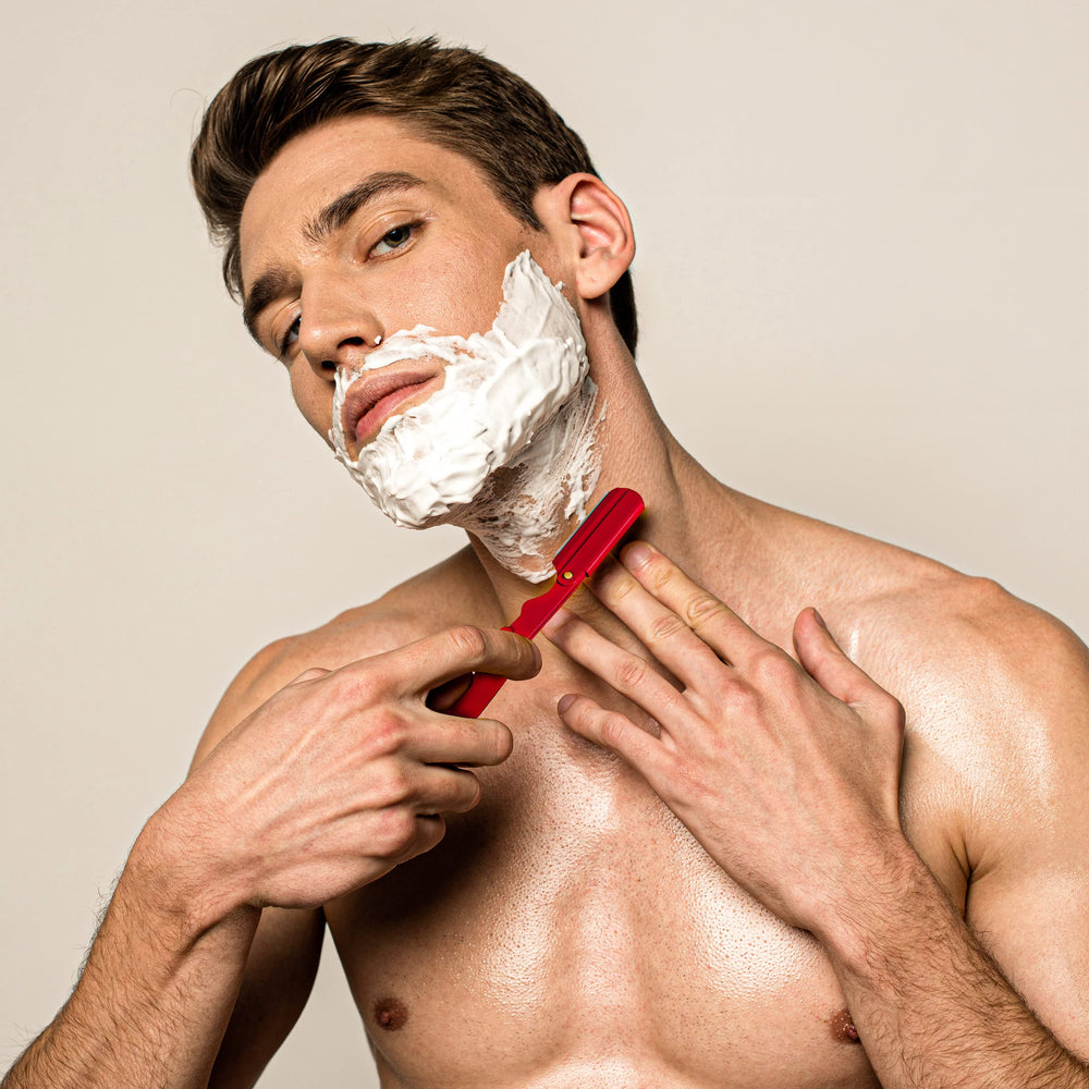 Utopia Care straight razor red packaging demonstrates organized blades and easy maintenance.