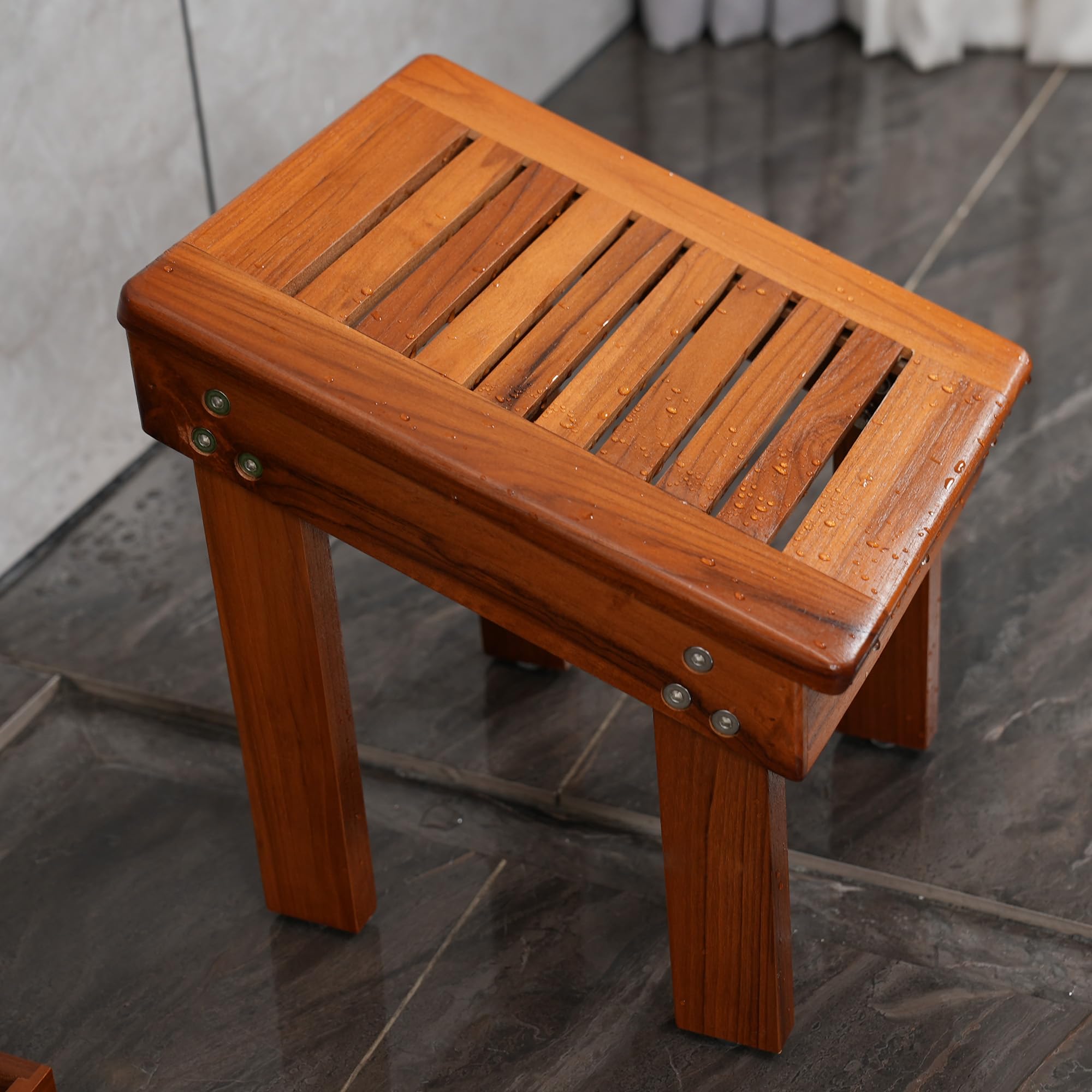 Utoplike Teak Shower Foot Stool features durable teak construction and lasting elegance.