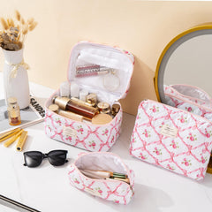 UUYUUY makeup bag pink floral side view highlights portable storage for travel essentials.
