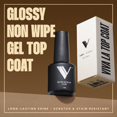 V Beauty Pure No Wipe Top Coat being brushed on for smooth, even application.