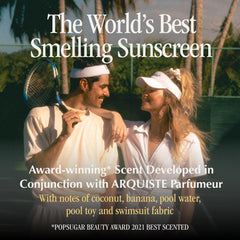 Vacation Classic Sunscreen Spray on a sunny beach conveys outdoor protection and carefree moments.
