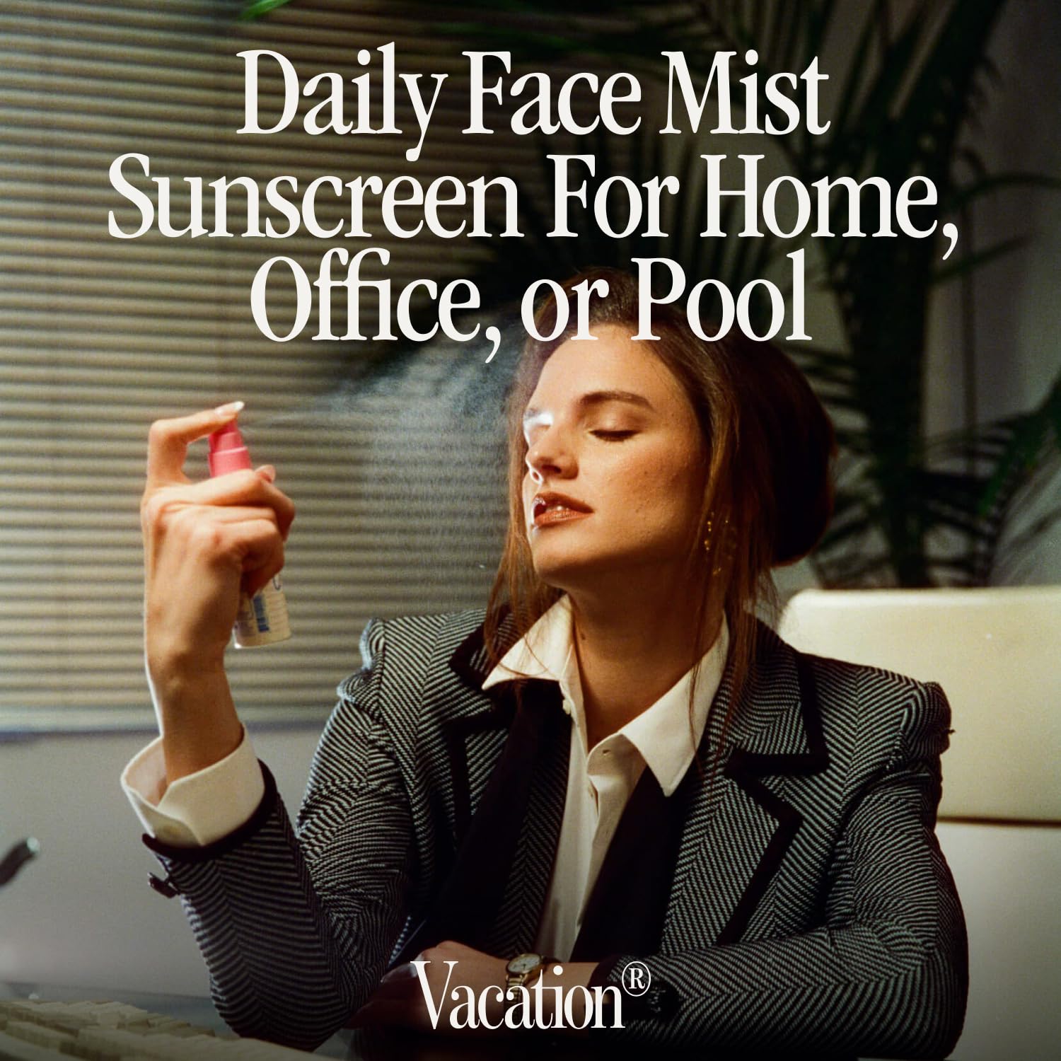 Vacation Super Spritz SPF50 face mist applied over makeup with seamless finish.