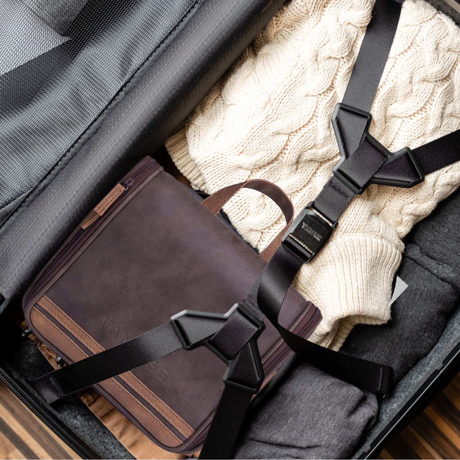 VACNASE hanging toiletry bag on desk during travel shows easy access.