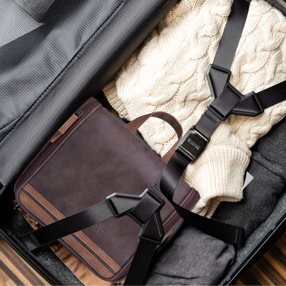 VACNASE hanging toiletry bag on desk during travel shows easy access.
