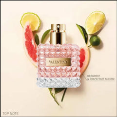 Valentino Donna EDP spray action for quick, effortless wear.