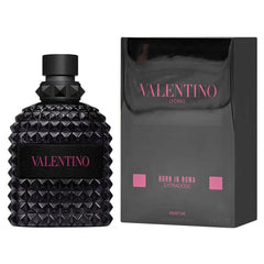 Valentino Uomo Born In Roma Extradose bottle being poured for a lasting evening scent.