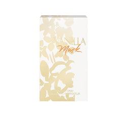 Vanilla Musk on a dresser with soft lighting for cozy evening fragrance.