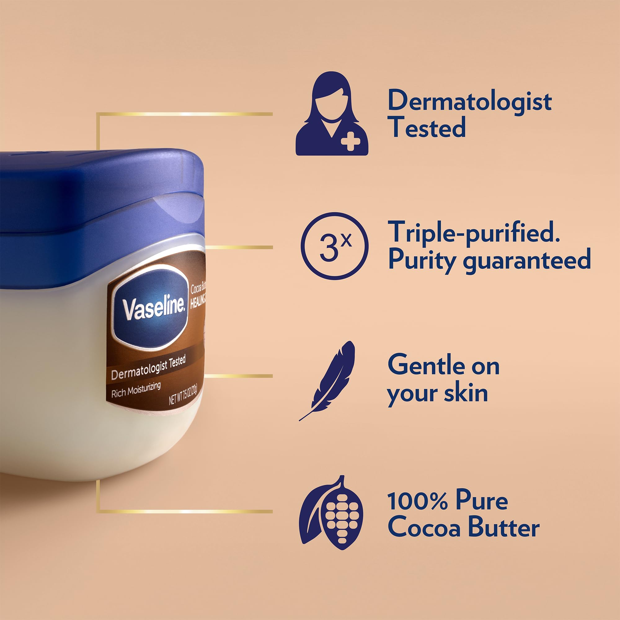 Vaseline Blueseal cocoa butter jelly being applied to hands shows smoothing dry skin.