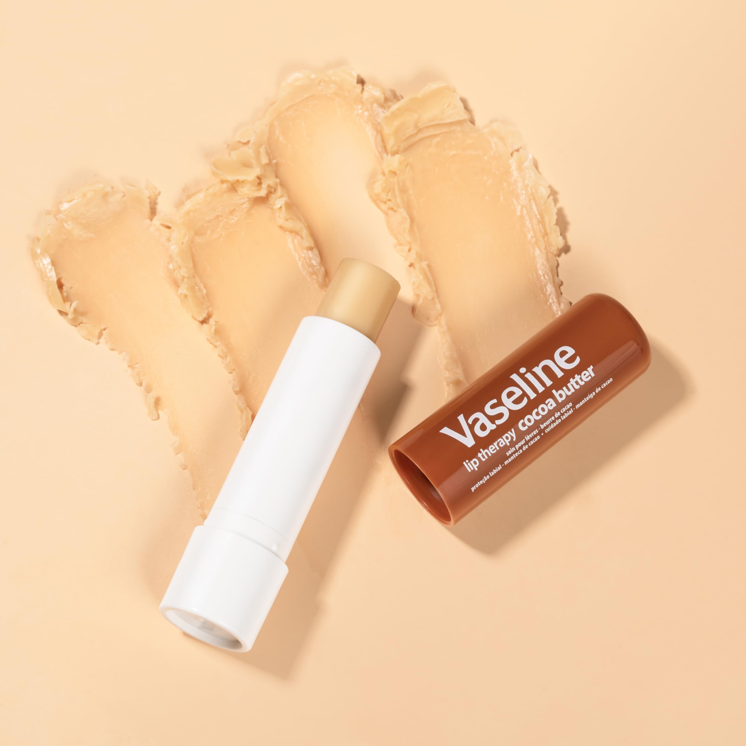 Vaseline Cocoa Butter Healing Jelly travel-sized jars keep moisture handy
