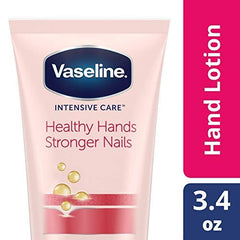 Application close-up of Vaseline hand cream smoothing skin and nails