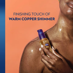 Vaseline Illuminate Me body oil being applied for radiant sheen.