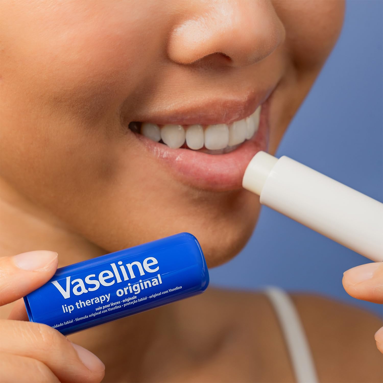 Vaseline Lip Therapy Original Pack bulk display suggests affordable lip care everywhere.