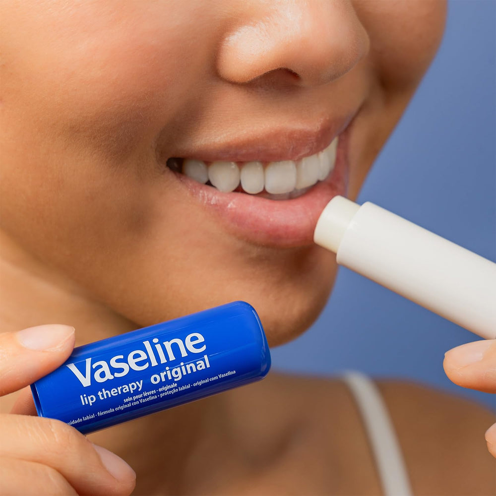 Vaseline Lip Therapy Original Pack bulk display suggests affordable lip care everywhere.