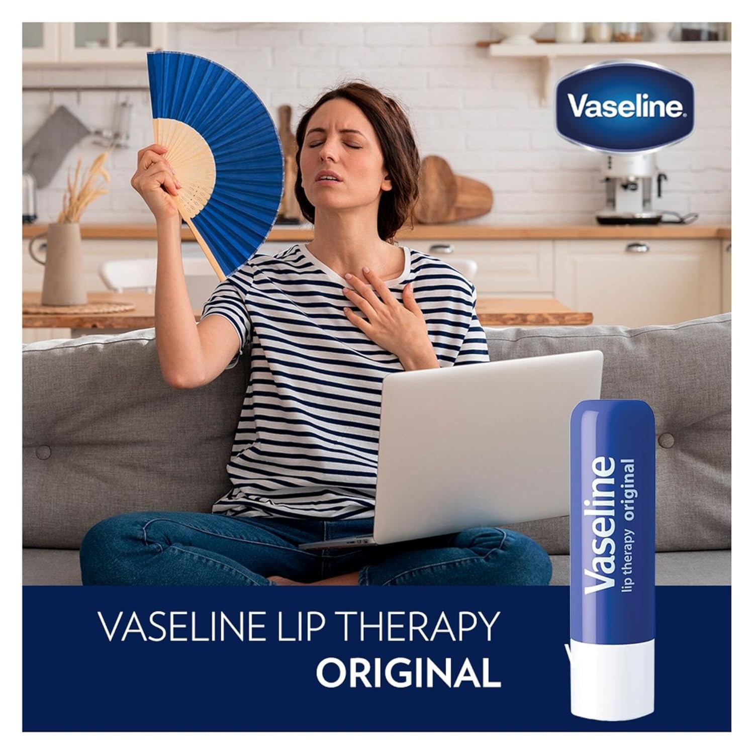 Vaseline Lip Therapy Original Pack closeup shows shea butter's creamy texture.