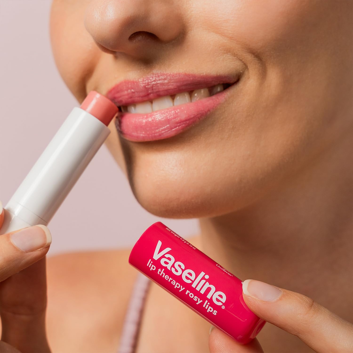 Vaseline Lip Therapy Rosy Lips daily-use kit on a vanity.
