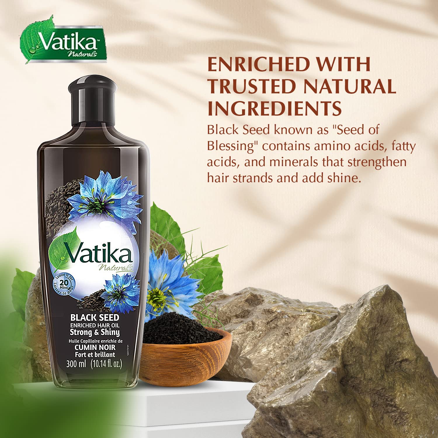 Vatika Naturals Dabur Enriched Black Seed Hair Oil applied through hair for smoothness and manageability.