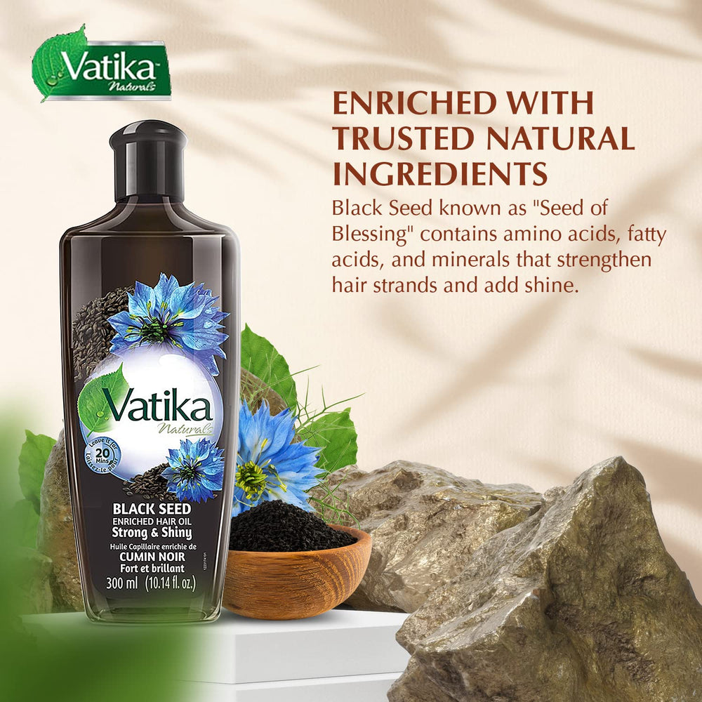 Vatika Naturals Dabur Enriched Black Seed Hair Oil applied through hair for smoothness and manageability.