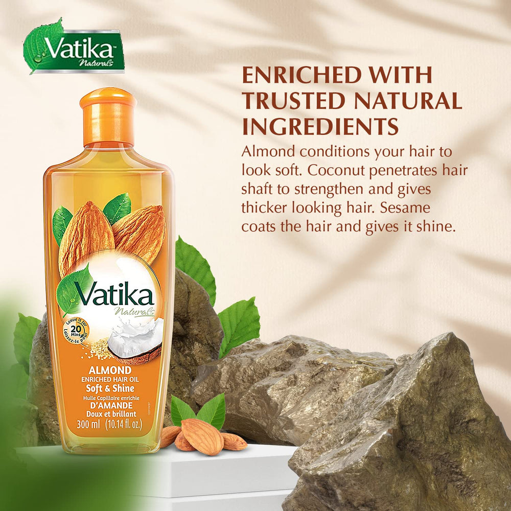 Vatika Naturals Dabur Hair Oil with almond ingredients for soft, hydrated hair.