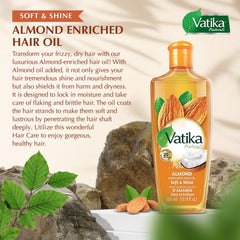 Vatika Naturals Dabur Hair Oil being poured for easy application and absorption.