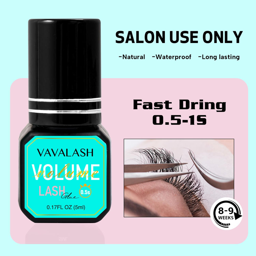 VAVALASH lash extension adhesive packaging and bottle sits on a professional workstation.