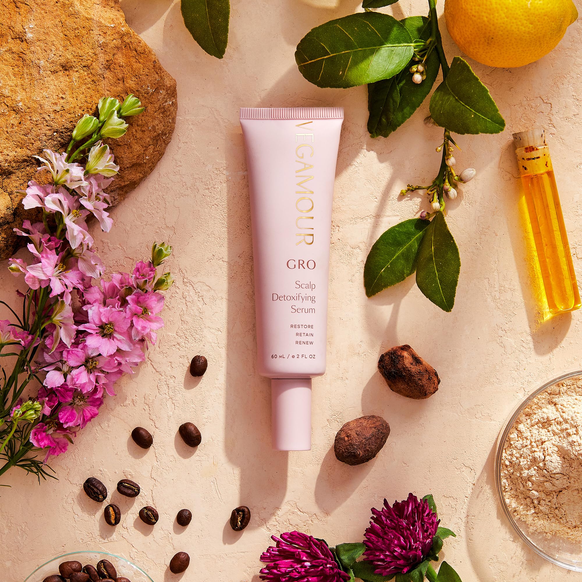 VEGAMOUR GRO Detoxifying Serum texture close-up showcases lightweight, fast-absorbing formula