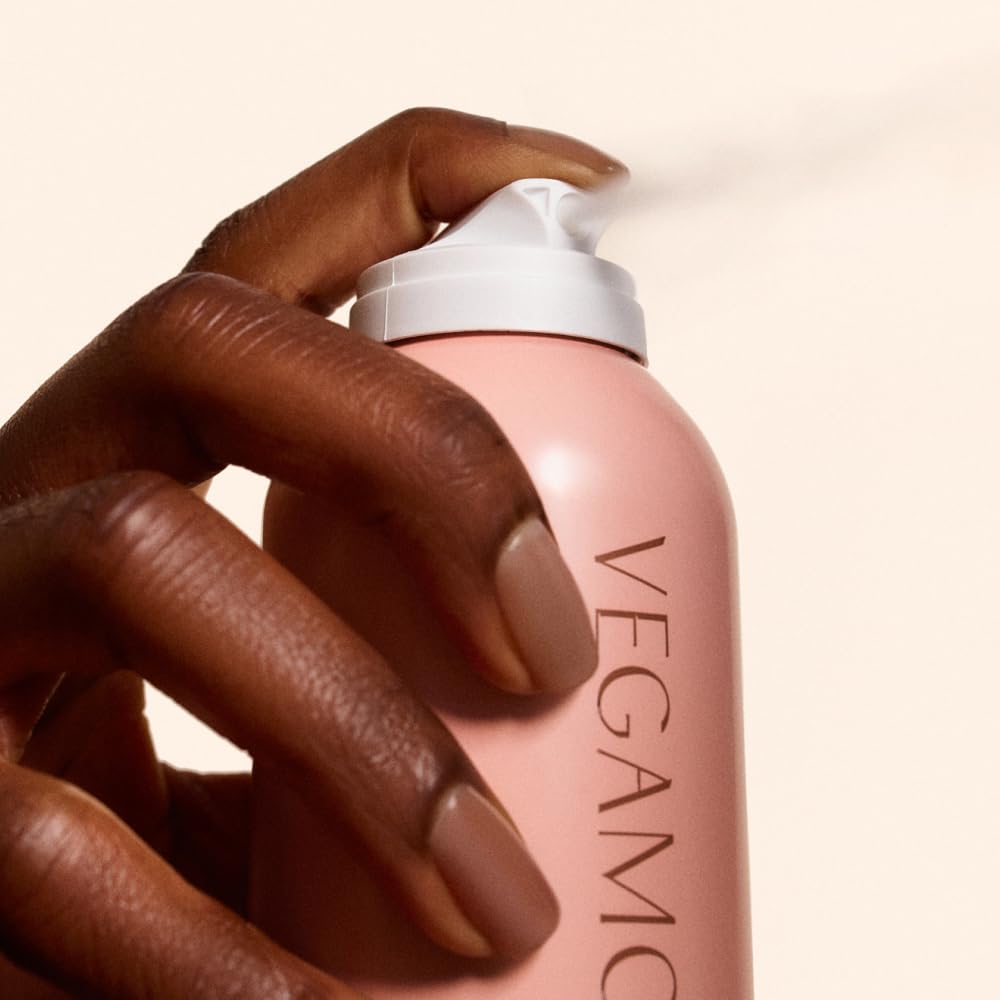 VEGAMOUR GRO Dry Shampoo bottle emits bergamot citrus scent for freshness