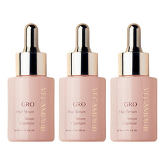 VEGAMOUR GRO Hair Serum bottle close-up shows non-oily formula for daily use.