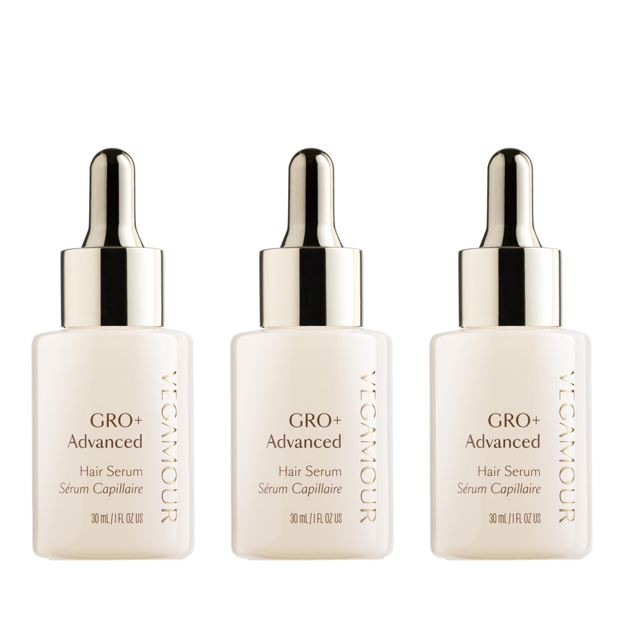VEGAMOUR GRO+ bottle close-up showing a lightweight serum for daily use.