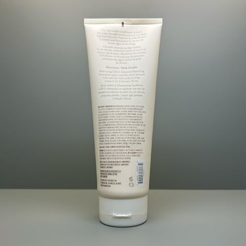 VEGAMOUR GRO+ Balancing Conditioner application in hands demonstrates root-to-tip coverage
