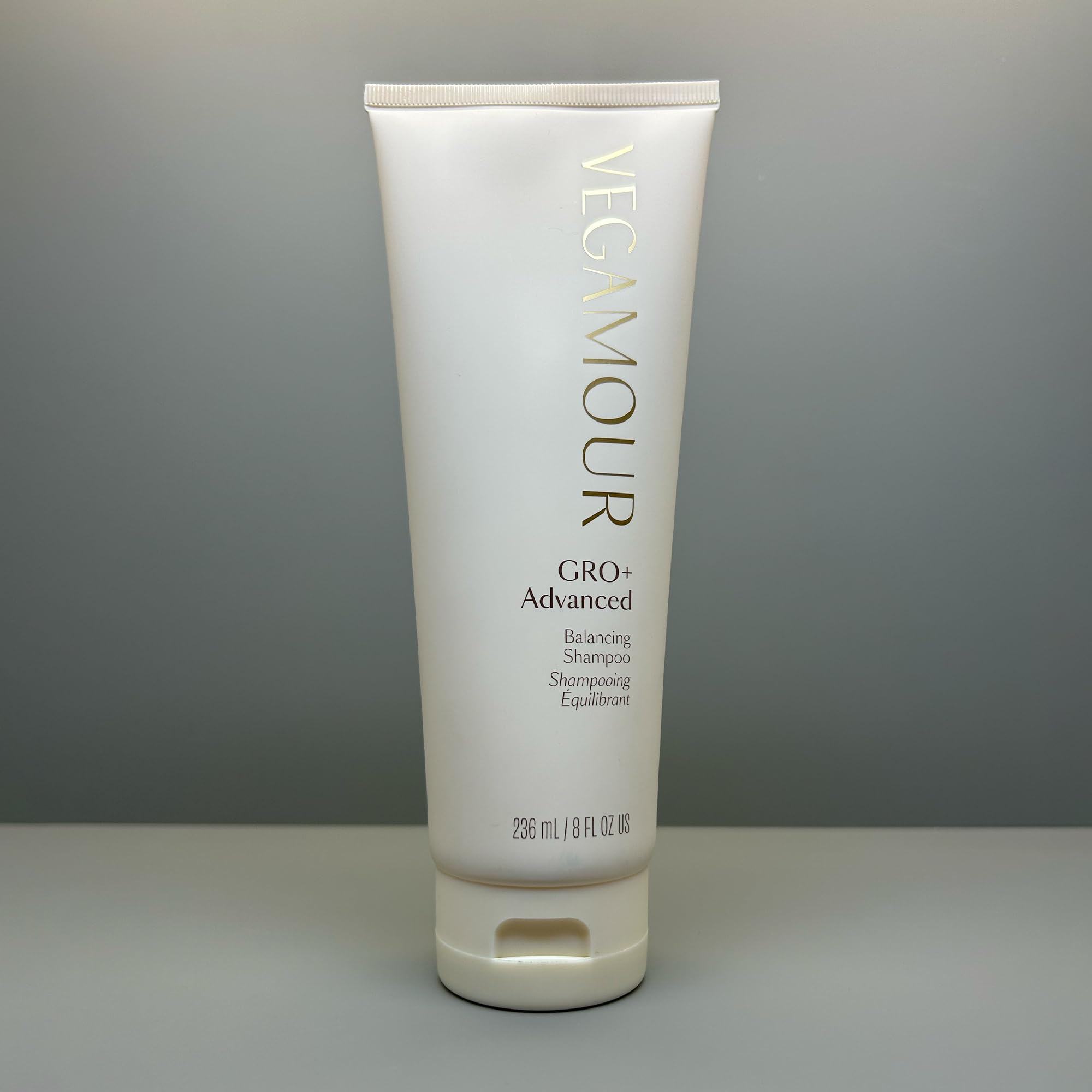 VEGAMOUR GRO+ scalp-care ritual image suggests daily routine.