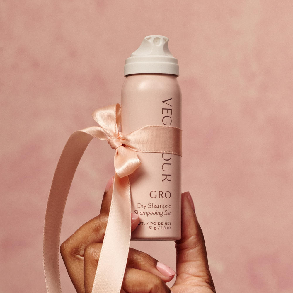 VEGAMOUR Bergamot-scented travel set for on-the-go hair care.