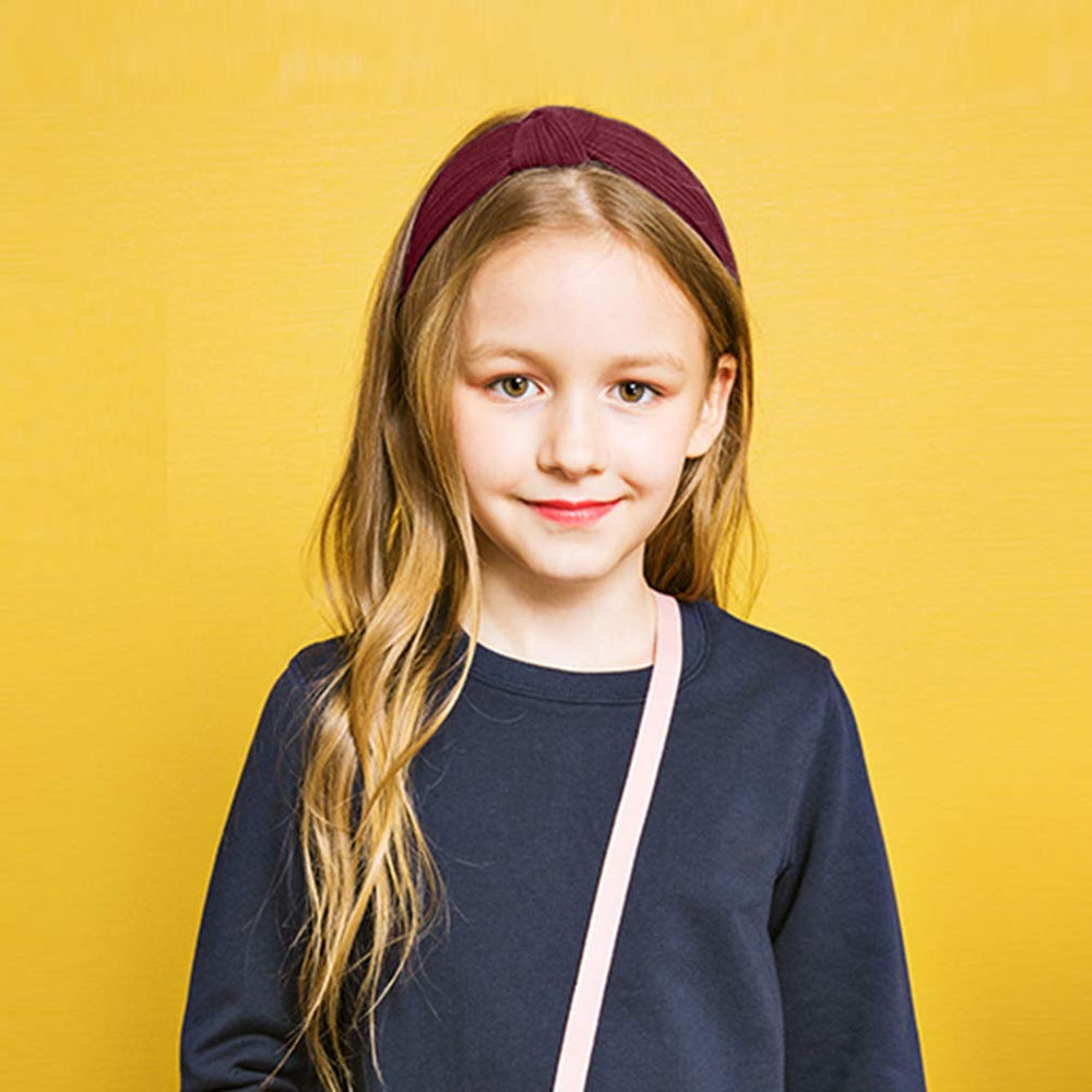 VELSCRUN bohemian style headband adds colorful accessory.