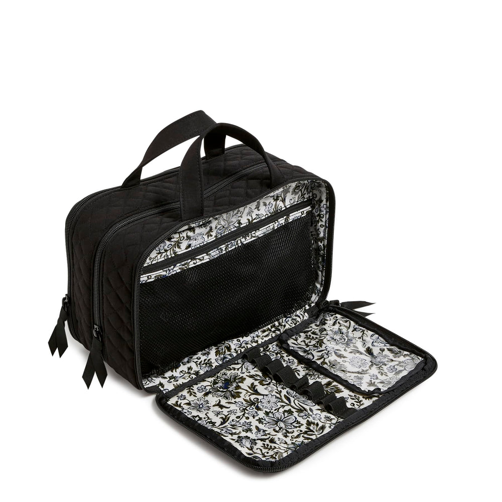 Vera Bradley black organizer with brush loops ideal for on-the-go routines.